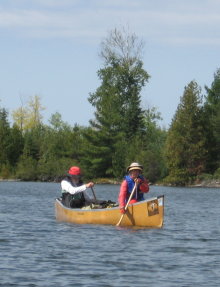 [Marilyn and Dick Opsahl paddling]